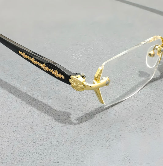 Iz Refined Elegance: Vintage-Inspired Rimless Eyewear Frame with minimalist Gold Design.