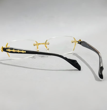Iz Refined Elegance: Vintage-Inspired Rimless Eyewear Frame with minimalist Gold Design.